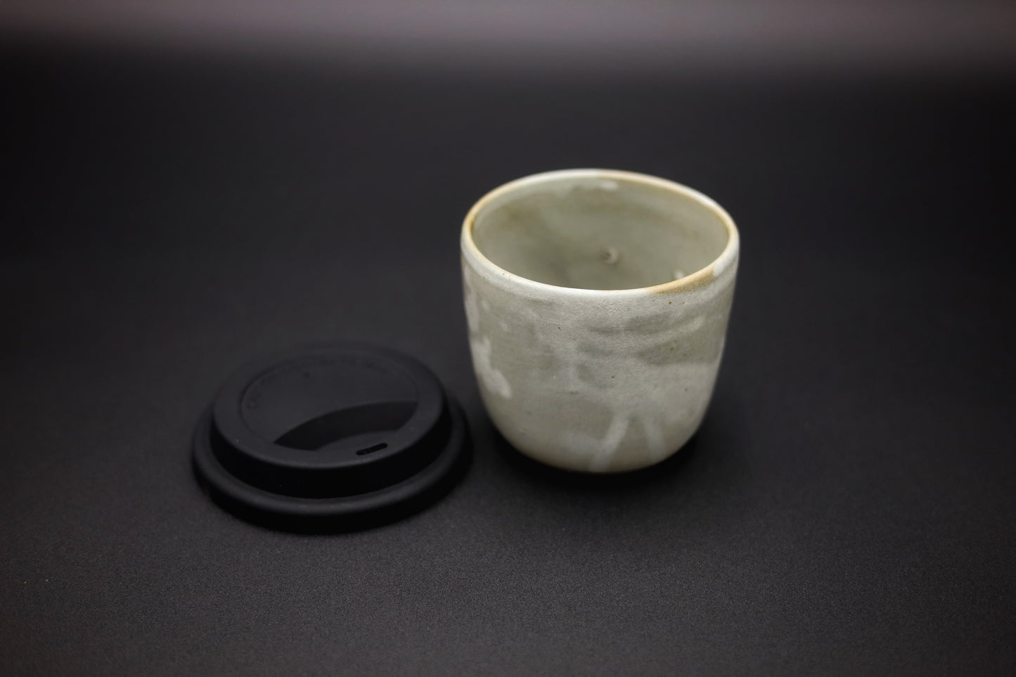 Handmade ceramic travel cup